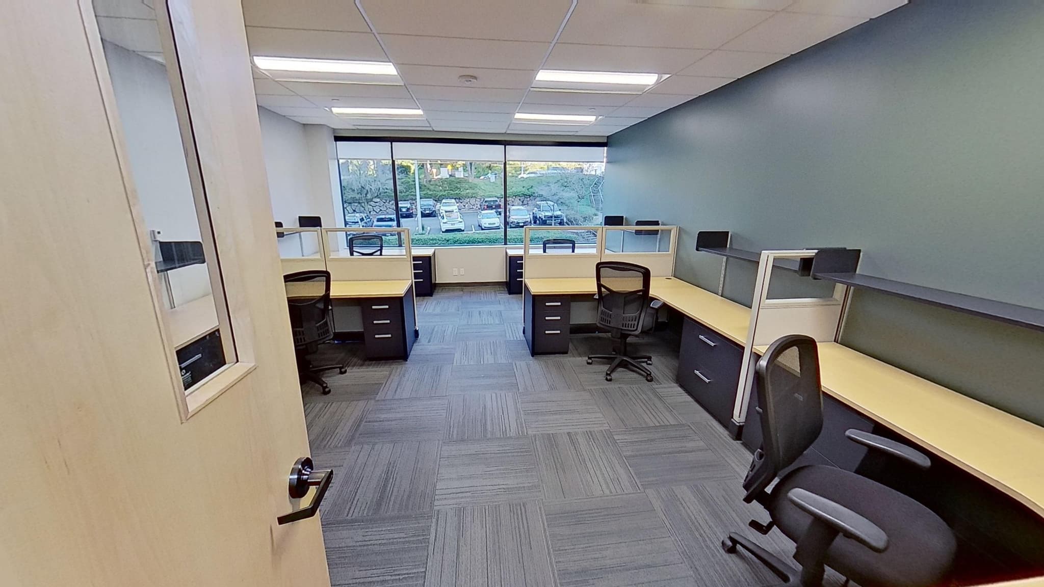 Luxury enterprise suite workspace with executive amenities