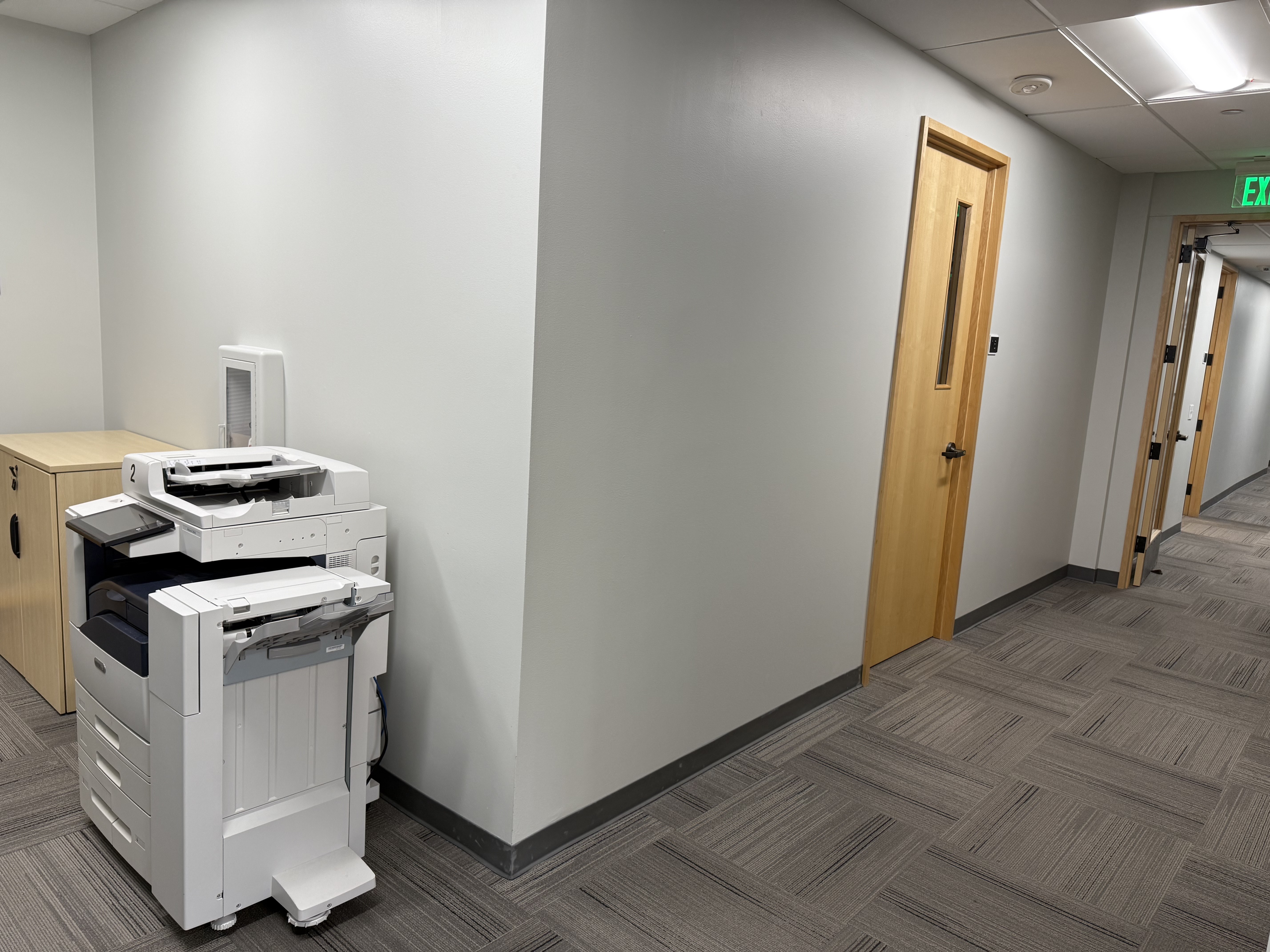 Common area with printer and amenities